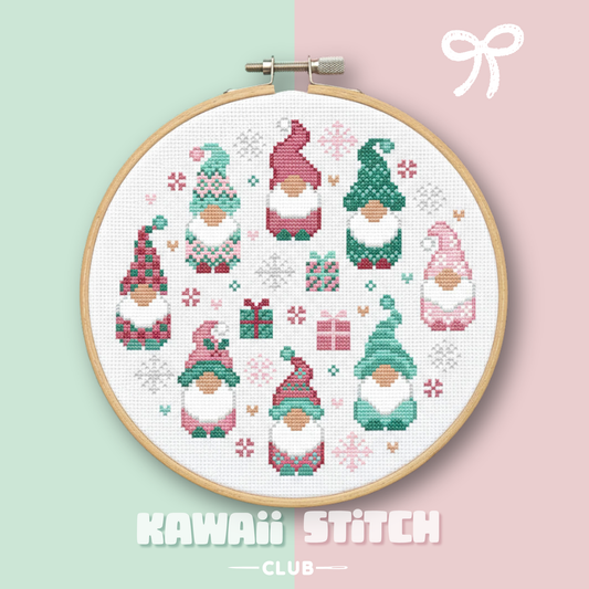 Eight pastel Christmas gnomes displayed in a wooden embroidery hoop on a mint and pink background