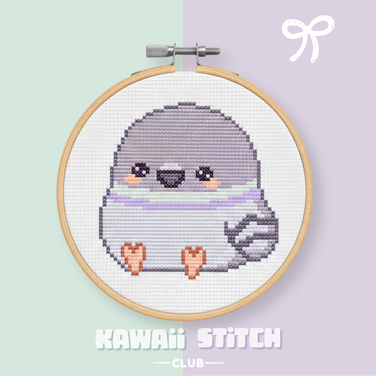 Finished kawaii baby pigeon cross stitch displayed in a wooden hoop