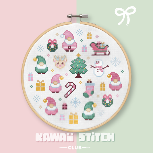 Pastel pink Santa Christmas motifs displayed in a wooden embroidery hoop