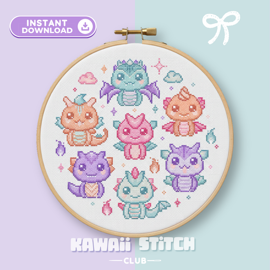 Seven kawaii baby dragons cross stitch pattern with pastel fantasy motifs in a hoop
