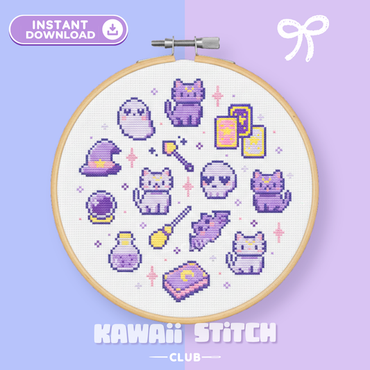 Witchy Cats cross stitch pattern displayed in an embroidery hoop